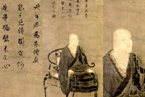 Details of an old scroll with Chinese characters over an image of Zen Master Dogen, seated in a chair, wearing dark robes. His head is shaved. The details of his face have faded.
