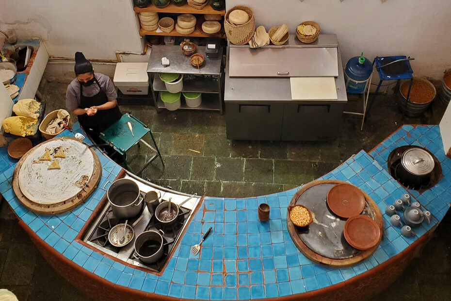 Looking down from above on the open air kitchen and comal at Tierra del Sol restaurant in Oaxaca