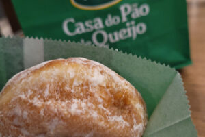 A breakfast donut stuffed with dulce del leche from Casa do Pao de Queijo at Sao Paulo GRU Airport Terminal 3